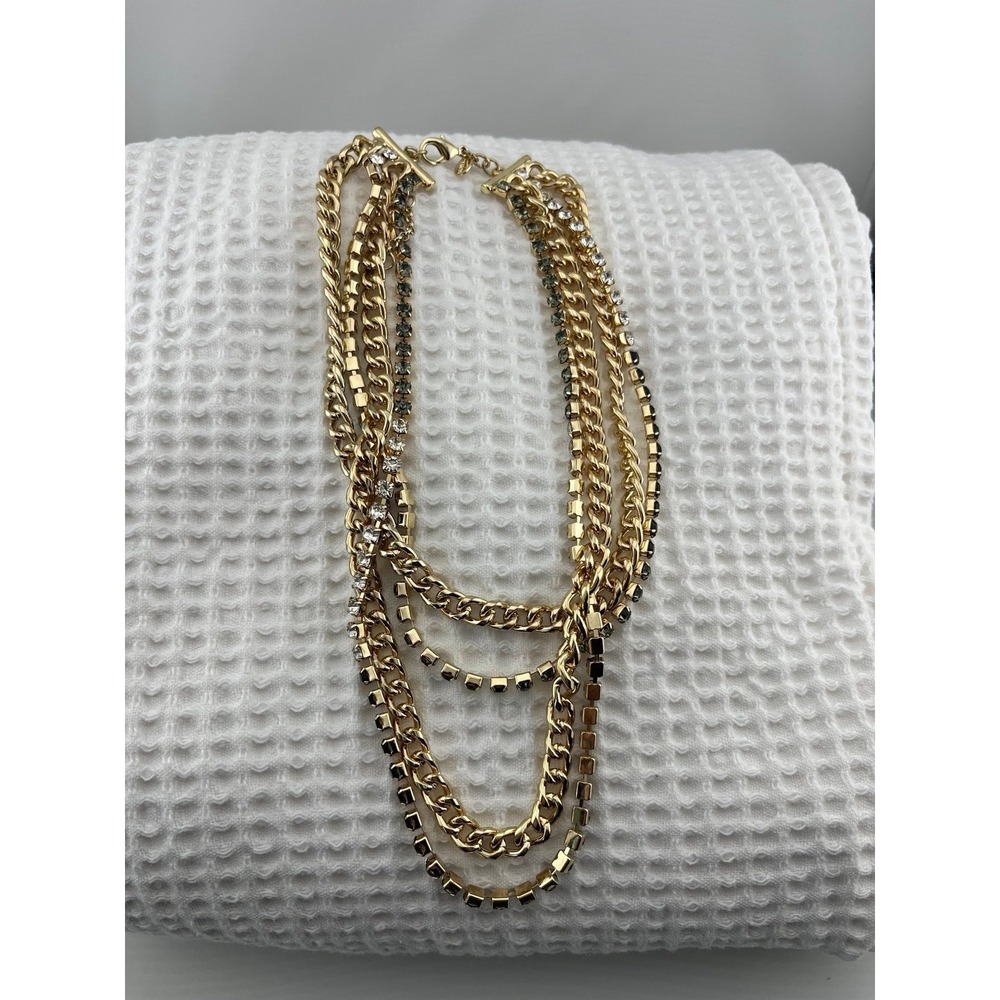 Four chain, gold‎ colored necklace